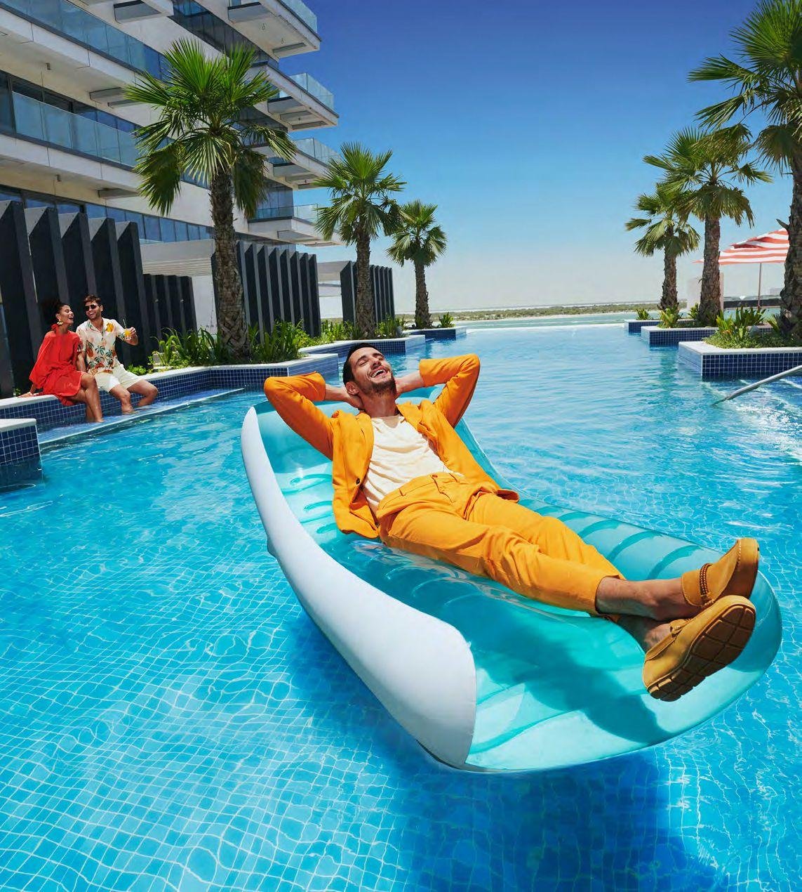 Mayan Yas Island Abu Dhabi waterfront residences with modern architecture, landscaped gardens, and luxury community living